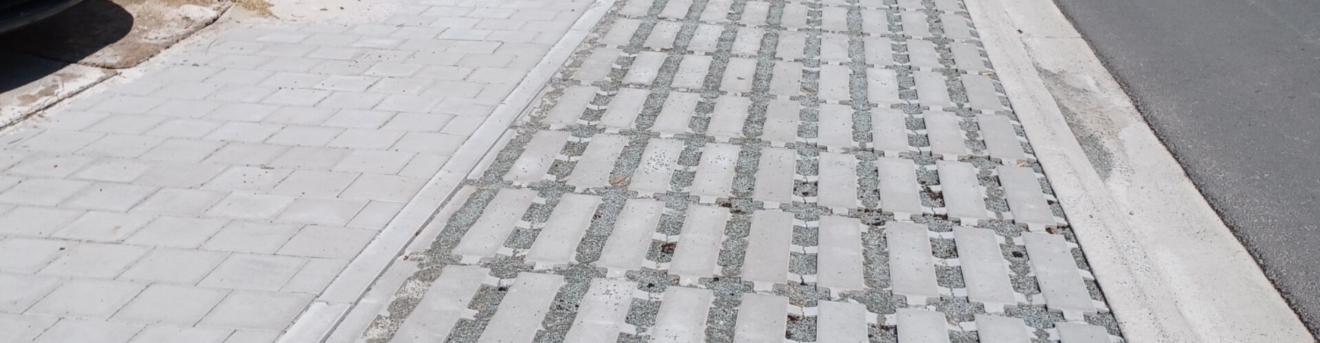 Lineaire grasbetontegels in Mostenstraat Merelbeke